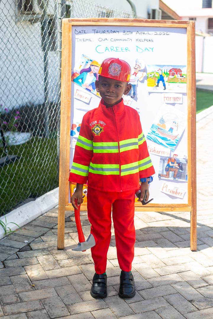 Career Day — child dressed as a firefighter
