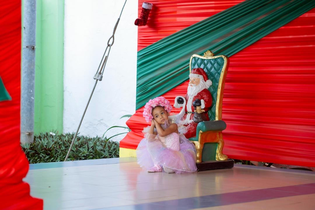 End of Year Show — ballet dancer by the Santa chair